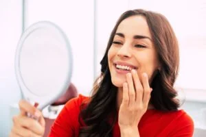 A woman smiling