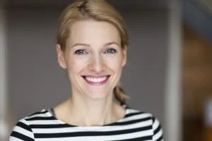 A woman smiling