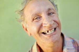 old man with missing tooth